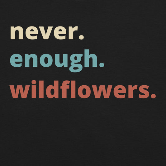Black t-shirt with Text 'never. enough. wildflowers.'