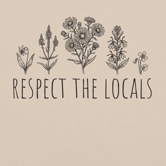 Beige t-shirt with wildflowers and 'respect the locals' text.