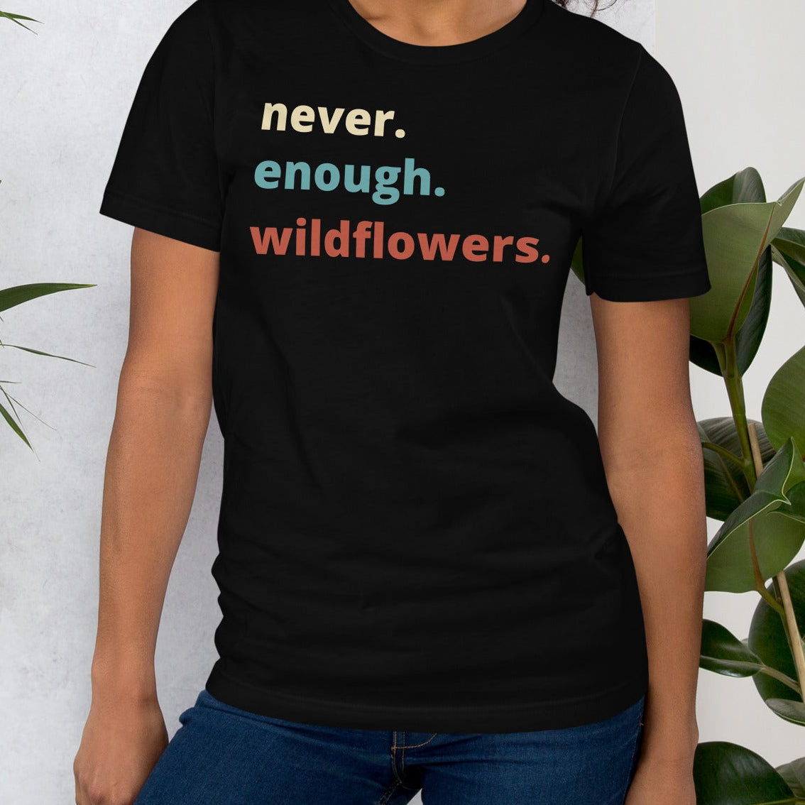 Black t-shirt with colorful text.