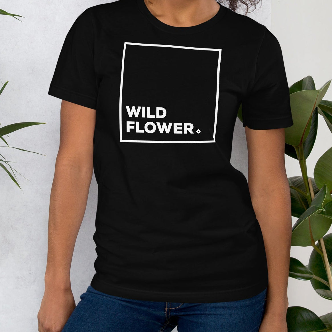 Black t-shirt with 'WILD FLOWER' text.