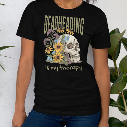 Black t-shirt with a skull and floral design.