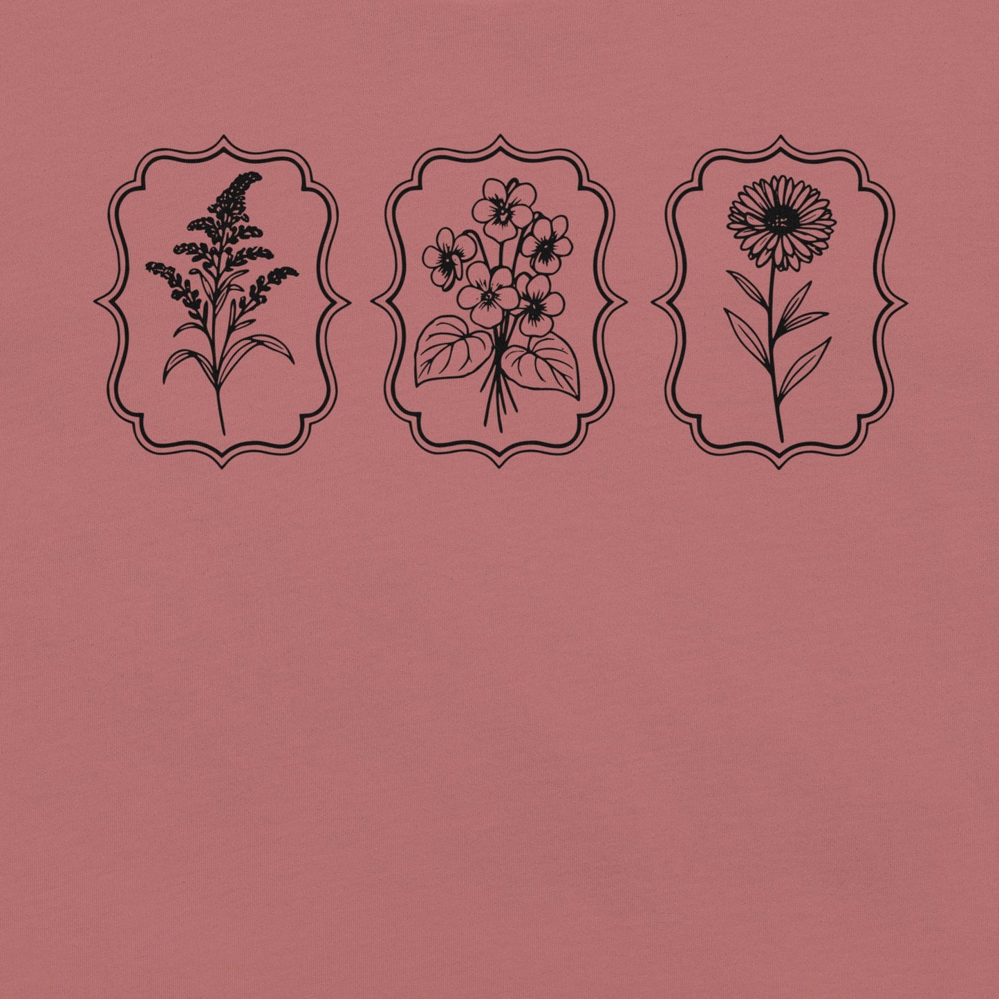 Mauve t-shirt with wildflower designs.