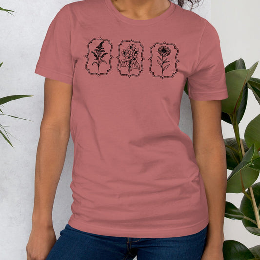 Mauve t-shirt with wildflower designs.