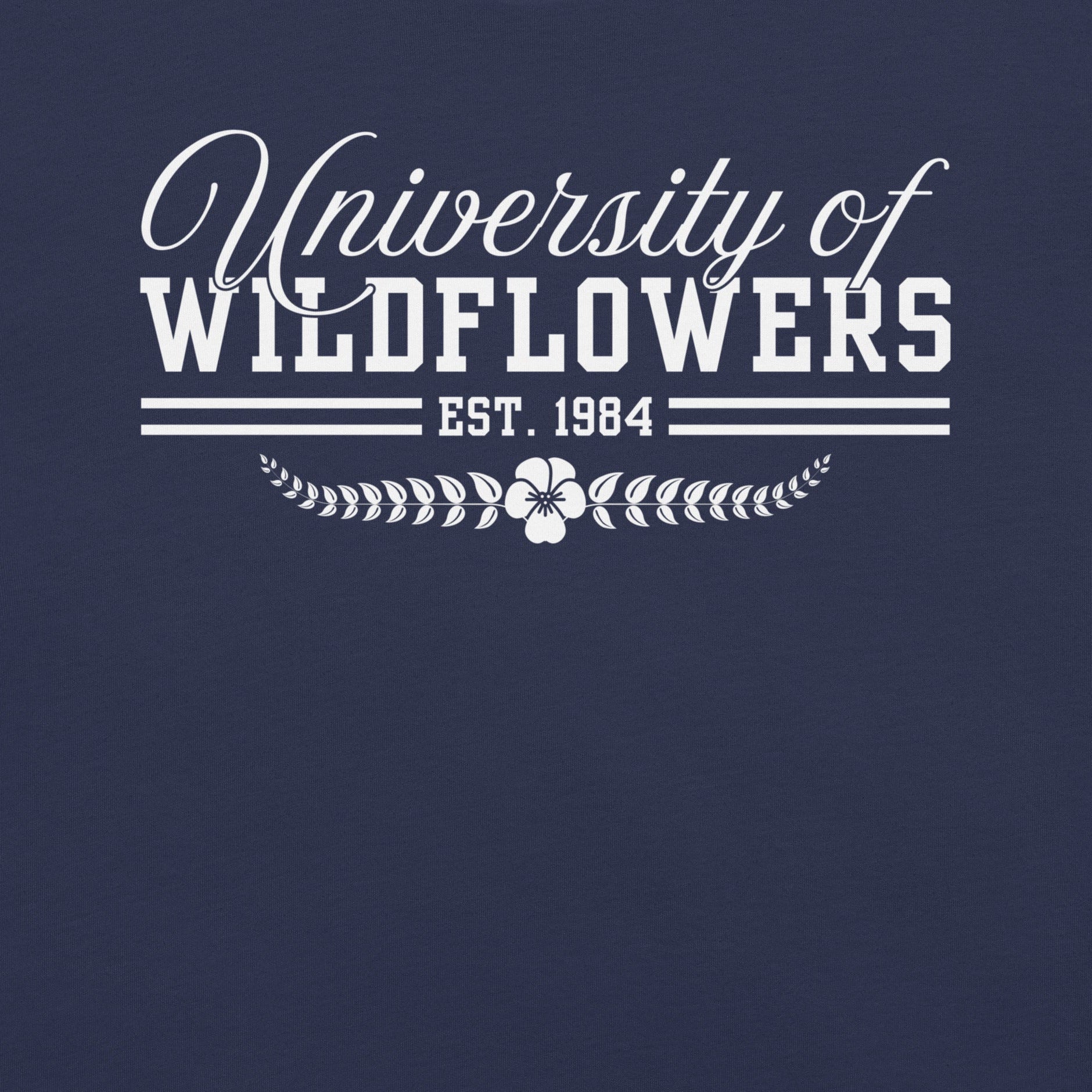 Navy blue shirt with 'University of Wildflowers Est. 1984' text.