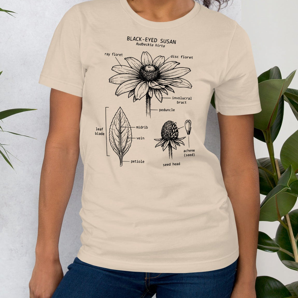 Beige t-shirt with wildflower anatomy design.