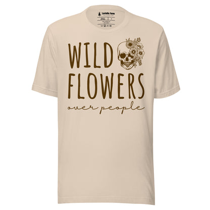 Beige t-shirt with 'Wild Flowers Over People' text and skull graphic.