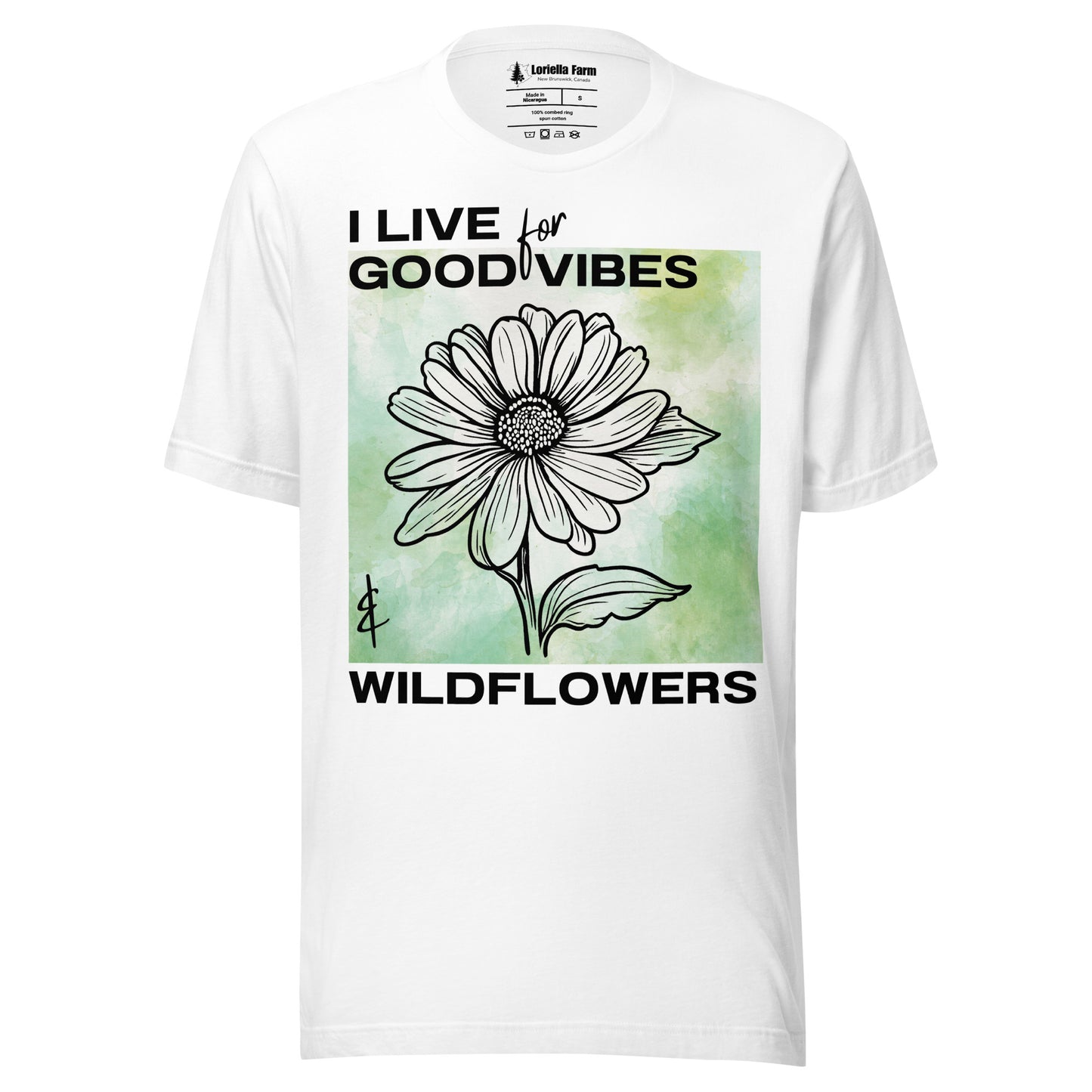 White t-shirt with a flower design and text.