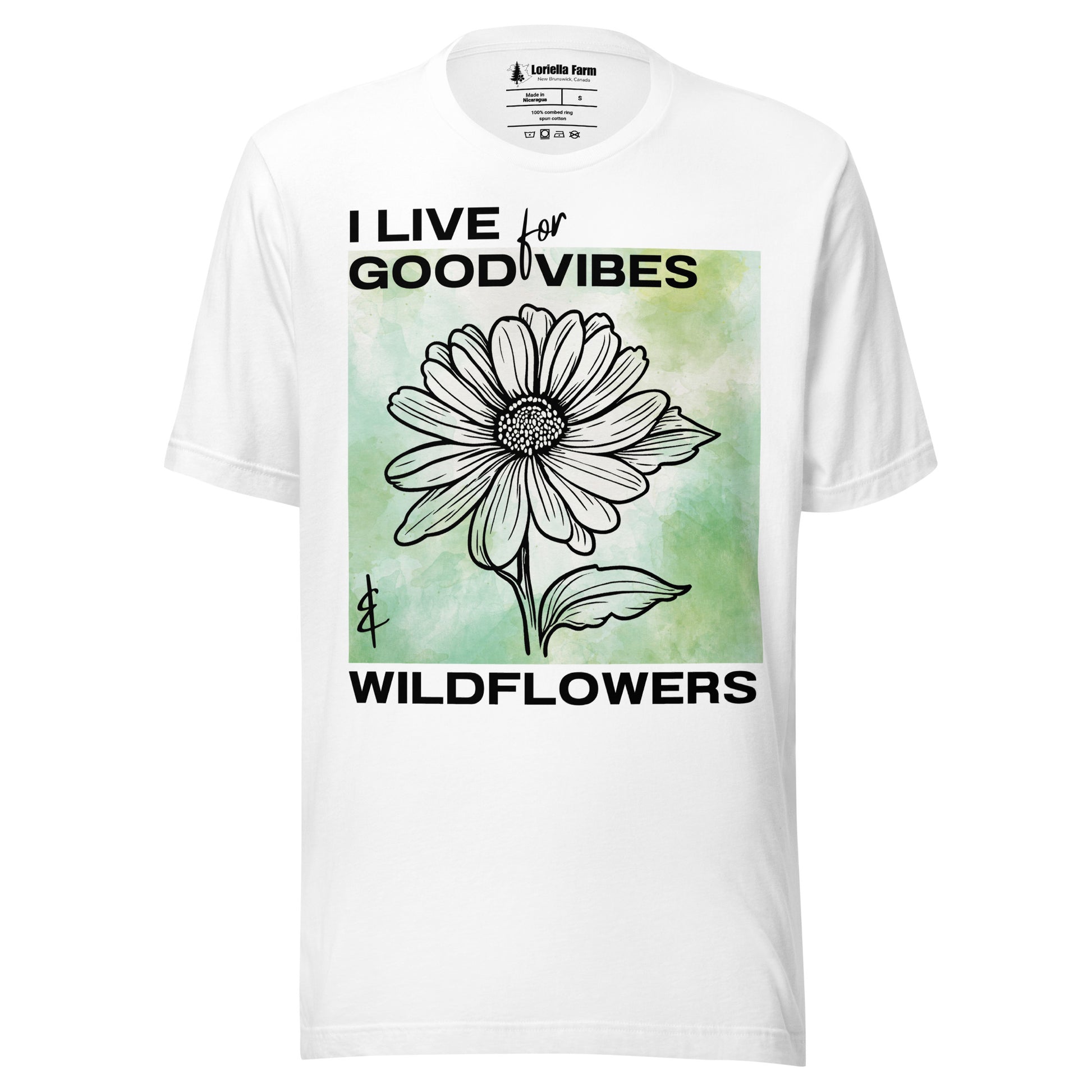 White t-shirt with a flower design and text.