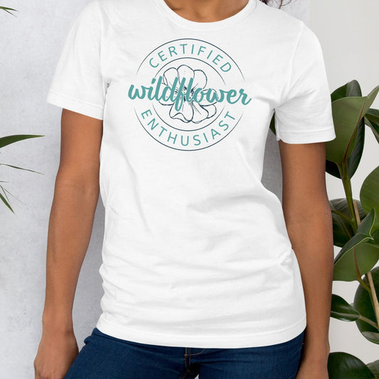 White t-shirt with 'Certified Wildflower Enthusiast' design.