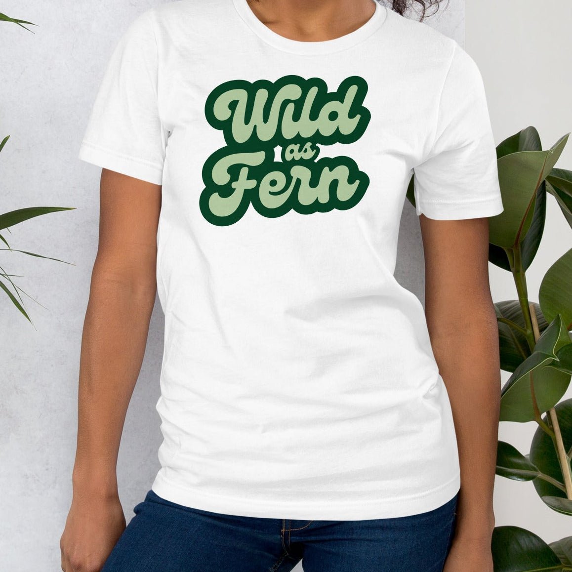 White t-shirt with 'Wild As Fern' text.