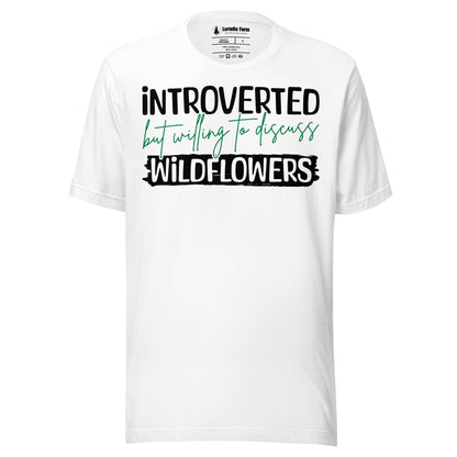 White t-shirt with text 'introverted but willing to discuss wildflowers'.