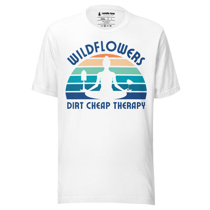 Black t-shirt with a graphic of a person meditating, wildflowers, and 'Dirt Cheap Therapy' text.