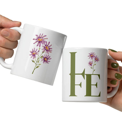 White mugs with floral design and 'LIFE' text.